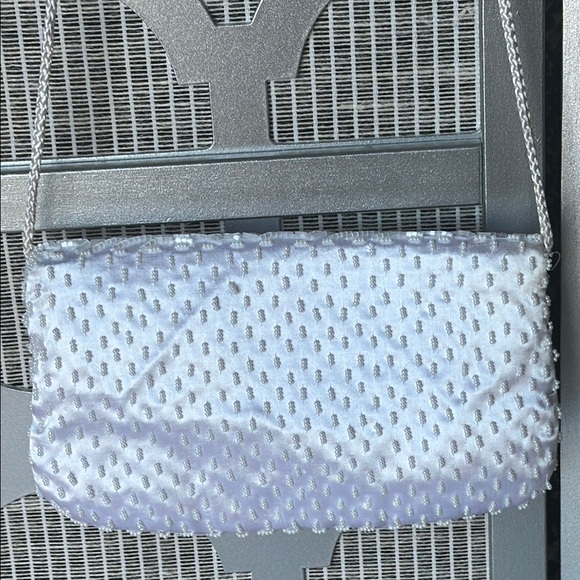 Chic White Wristlet Clutch with Intricate Design - Picture 10 of 10